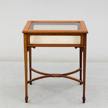 An early 20th century display table.