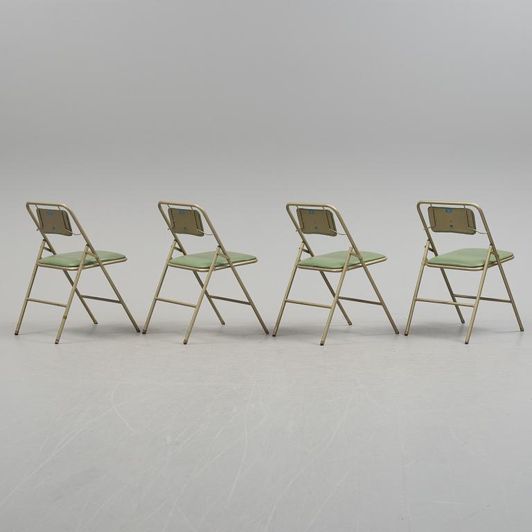 A table and four chairs by Dipetrol, second half of the 20th century.