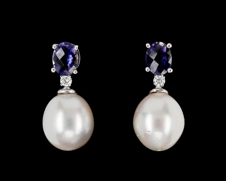 EARRINGS, iolites, brilliant cut diamonds and cultured South sea pearls.