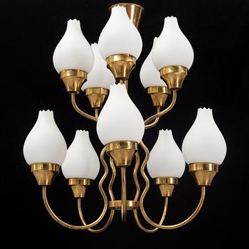 A brass and glass ceiling lamp for ten lights, first half 20th century.