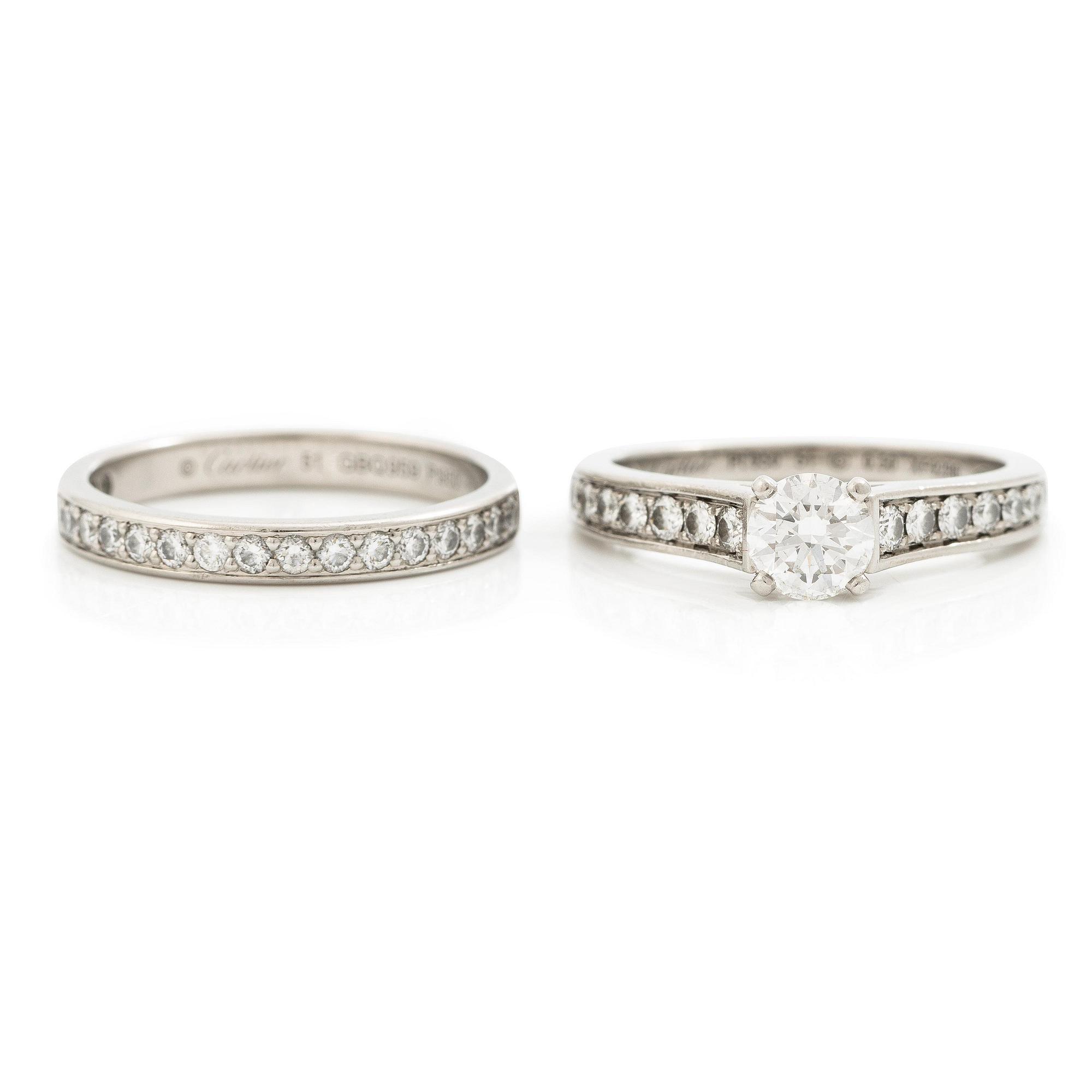 Cartier two rings platinum with round brilliant-cut diamonds.