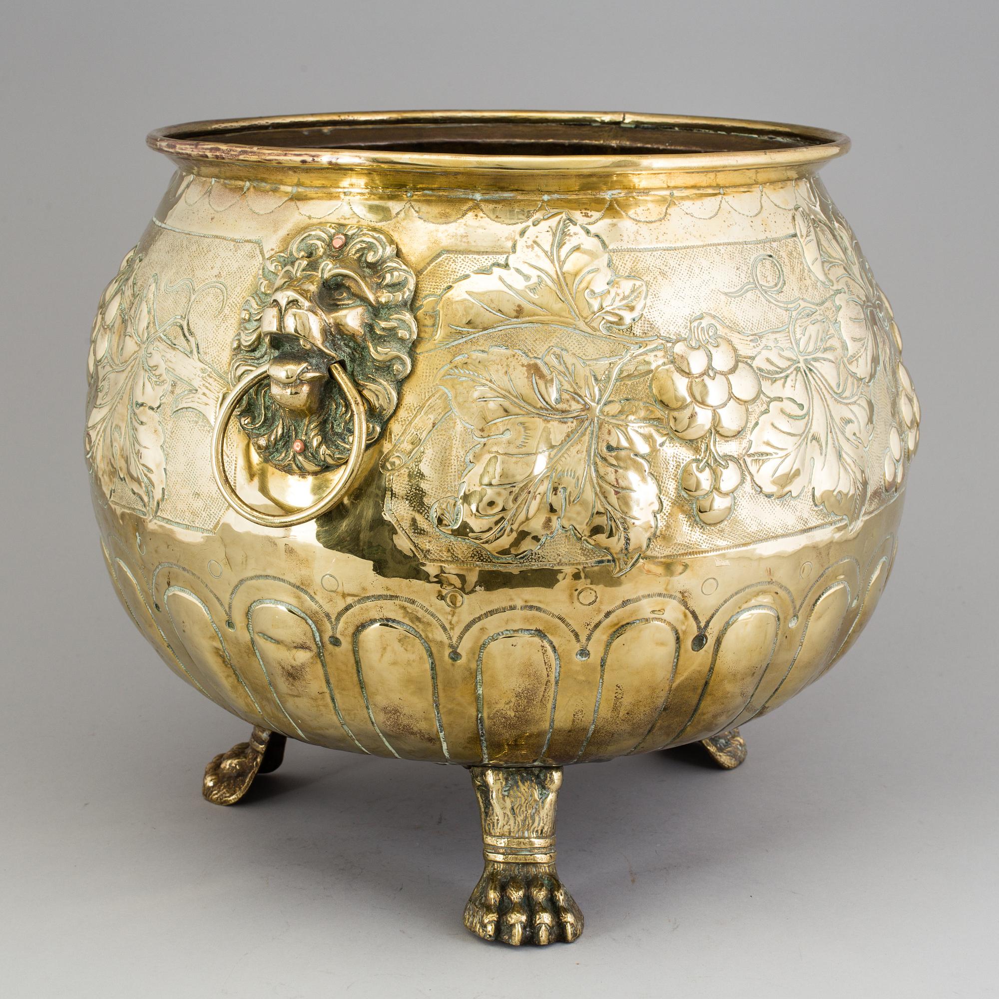 A 19th century brass flower pot.