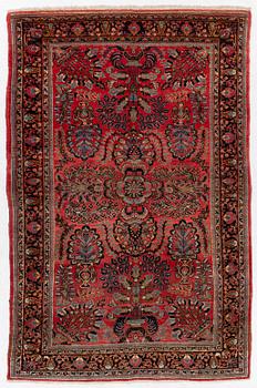 A semi-antique 'Mahajiran' Sarouk carpet, c 275 x 185 cm.