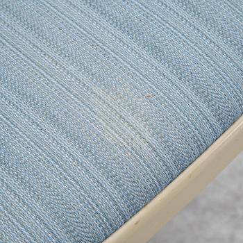 A dining table with six chairs by Carl Malmsten, second half of the 20th Century.