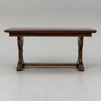 A mid 20th century baroque style dining table.