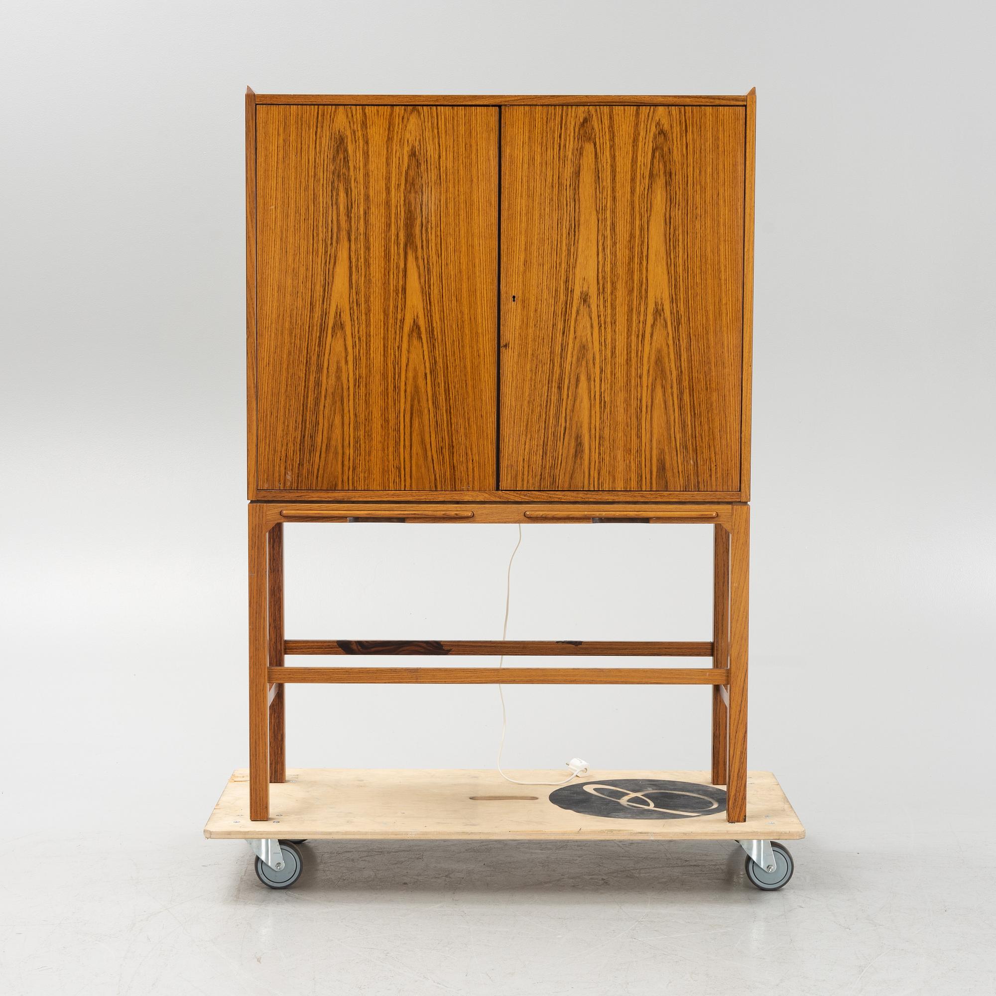 A mid 20th century bar cabinet.