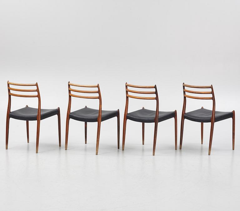 Niles Otto Møller, a rosewood veneered table with four chairs, JL Møller, Denmark, 1950's/60's.