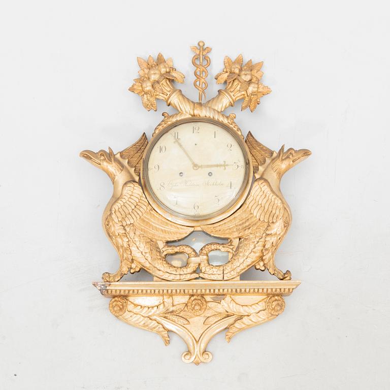 A signed gilded wall clock by Ephraim Hedström early 1800s.