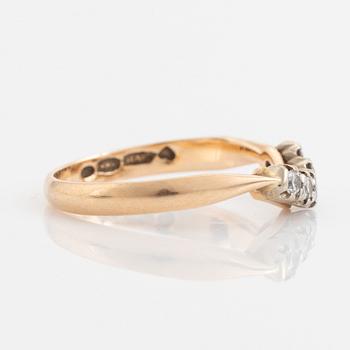 Gold and small brilliant cut diamond ring.