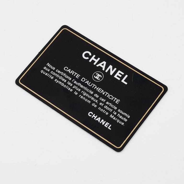 Chanel, a quilted silver leather wallet, 2006-08.