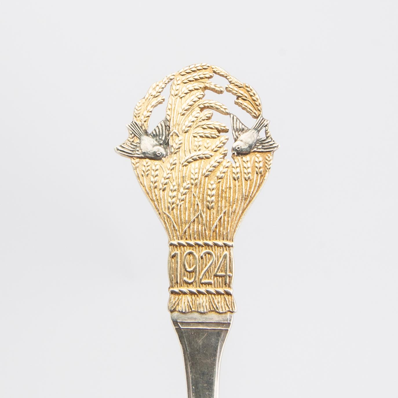 Anton Michelsen, Christmas cutlery, 21 pieces, gilded sterling silver and enamel, Denmark total weight 888 grams.