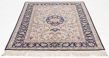 An Isfahan rug, c. 220 x 145 cm.