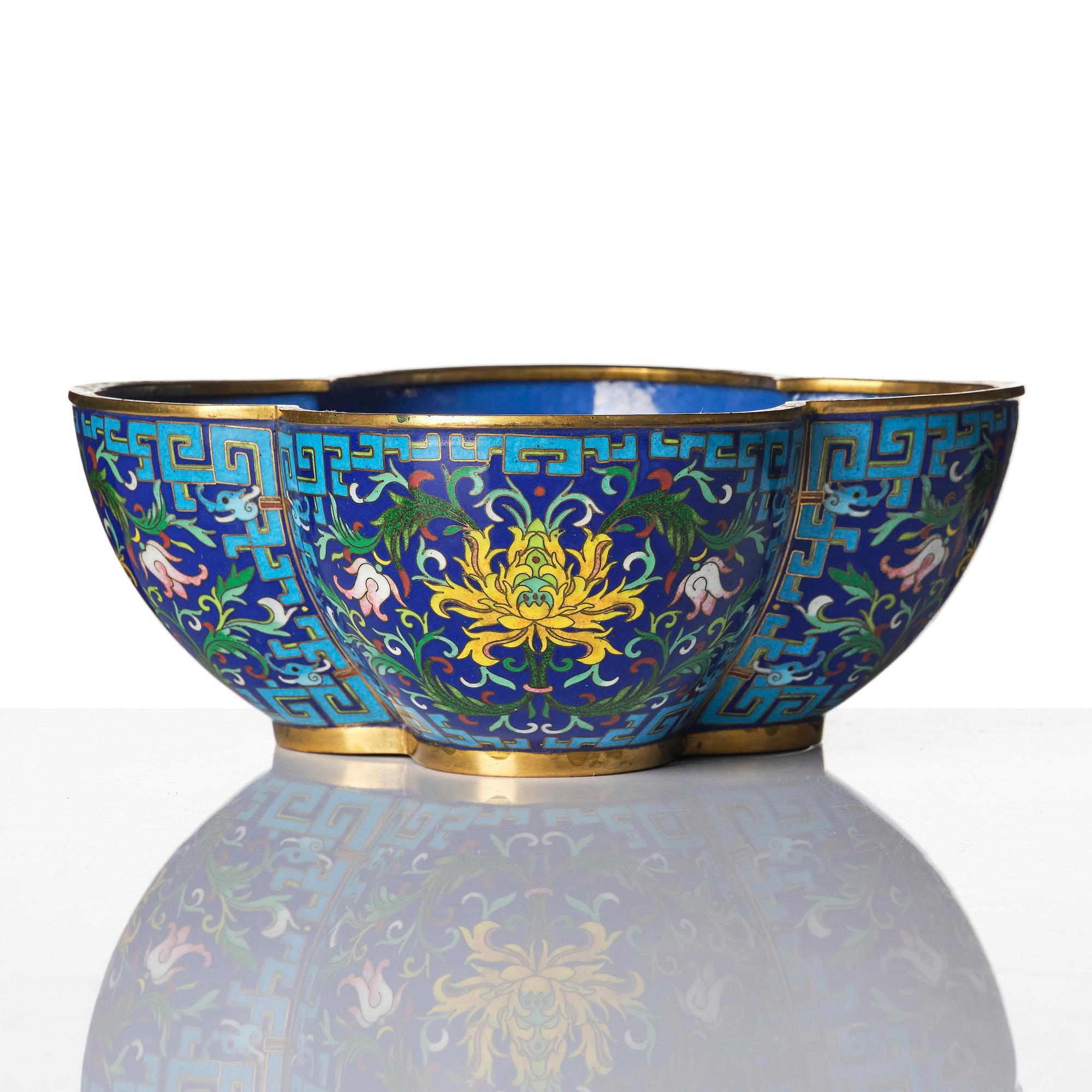 A quatre-foil  'lotus' jardiniere, late Qing dynasty.