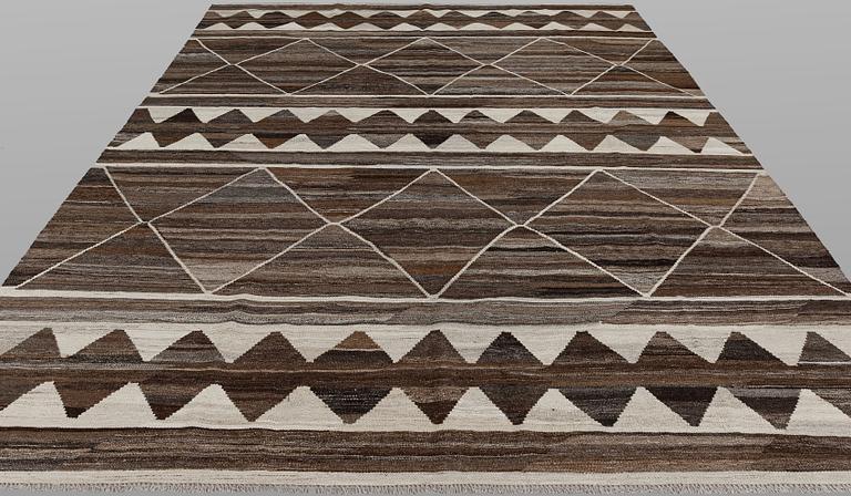 A carpet Kilim, Moroccan design, c. 301 x 250 cm.