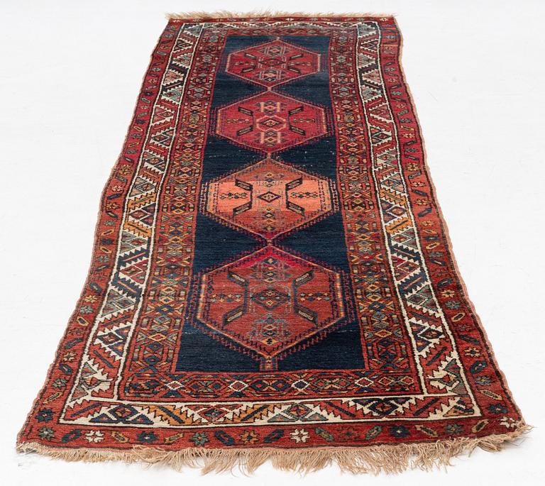 An antique Anatolian/Caucasian runner, c 337 x 99 cm.