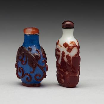 Two Chinese Peking glass snuff bottles, 20th Century.