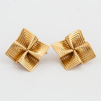 A pair of Tiffany & Co 14K gold earrings.