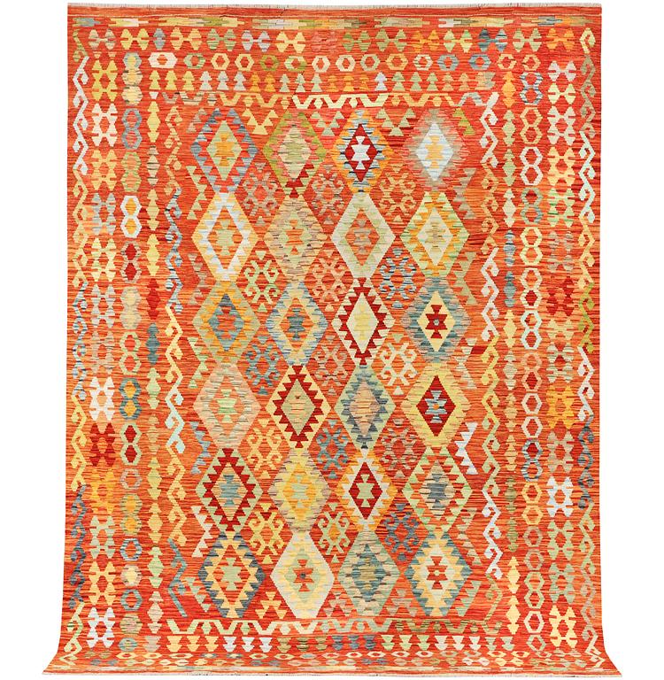 A Kilim carpet, c. 343 x 247 cm.