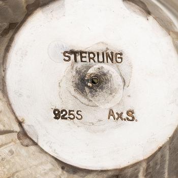 A pair of Rococo style sterling silver candelsticks, Swedish import mark.