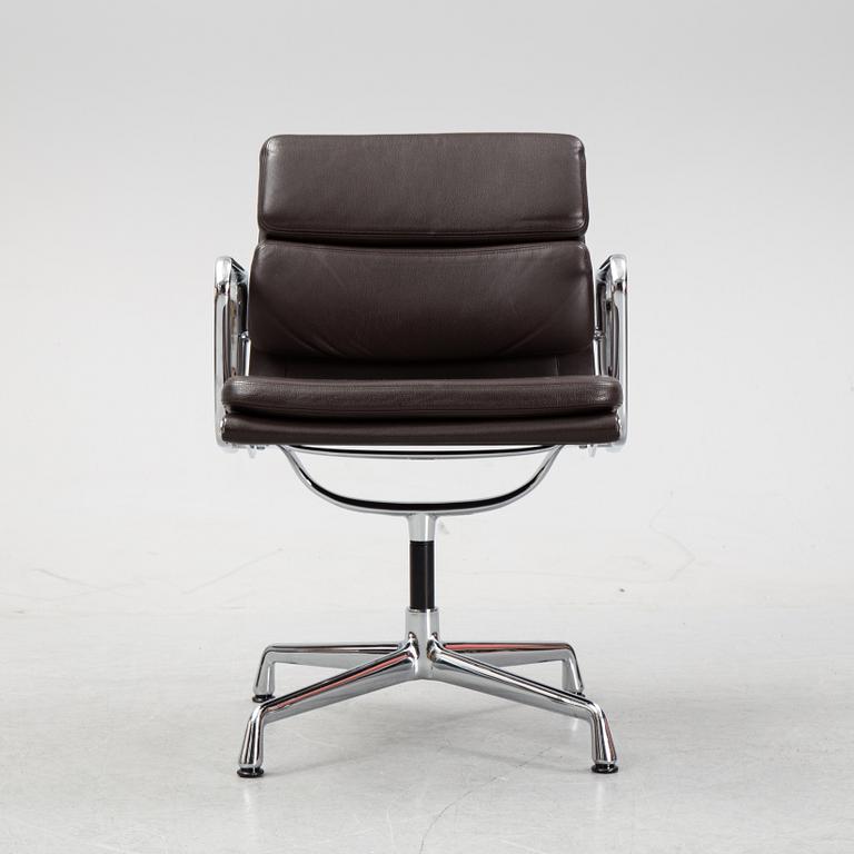 An EA 208 Soft Pad swivel chair by Charles and Ray Eames for Vitra, dated 2010.