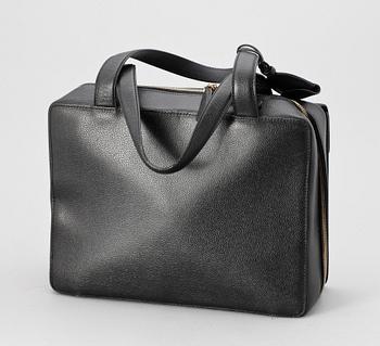 A 21th cent black "caviar" leather beautybox/weekendbag by Chanel.