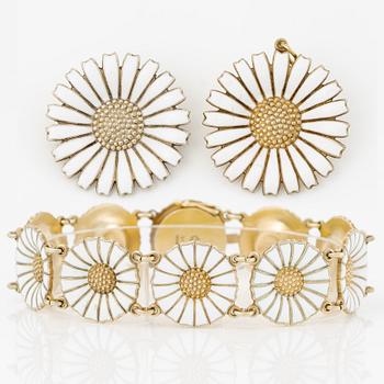 Georg Jensen and A Michelsen "Daisy" a bracelet, a pendant, and a brooch silver gilt and enamel.