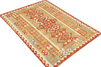 An Afghan Kilim rug, c. 200 x 150 cm.