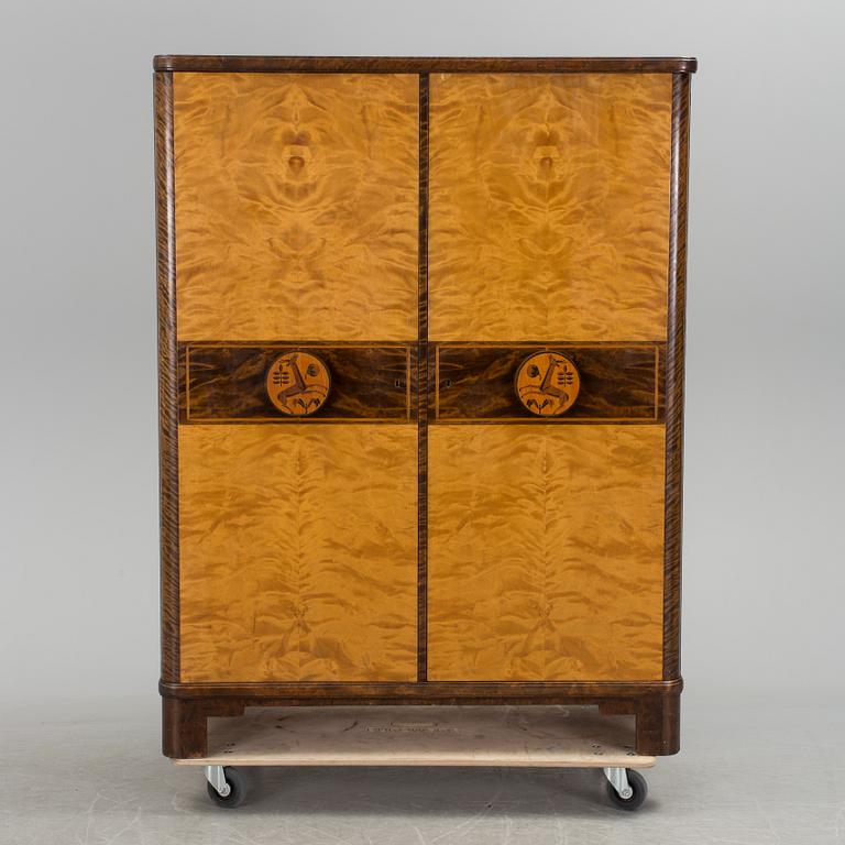 Otto Schulz, A Swedish Modern stained birch cabinet, probably Otto Schulz for Boet, 1930's.