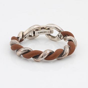 Hermès, a silver and leather bracelet, 2009.