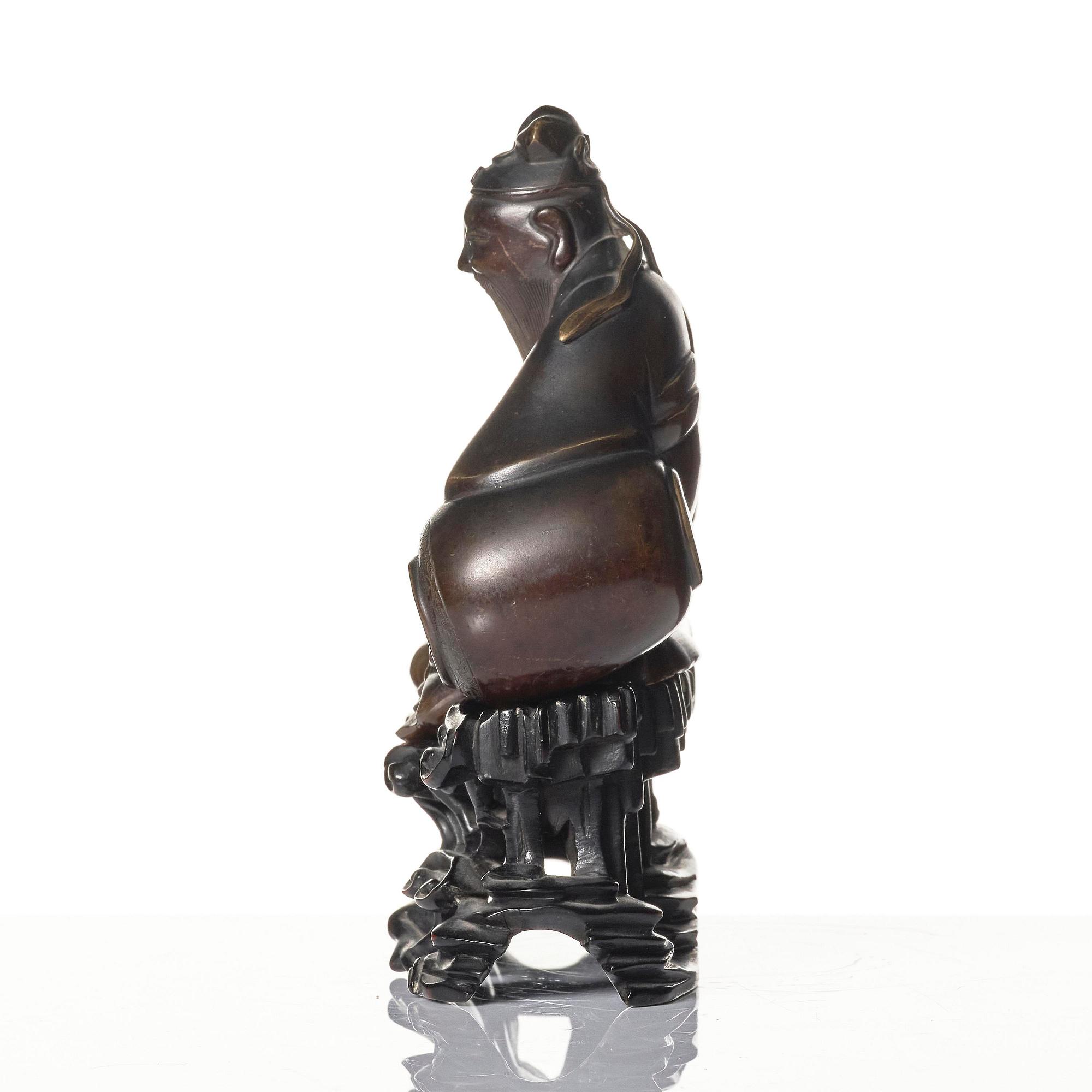A bronze sculpture of the drunken poet Li Bai, Qing dynasty.