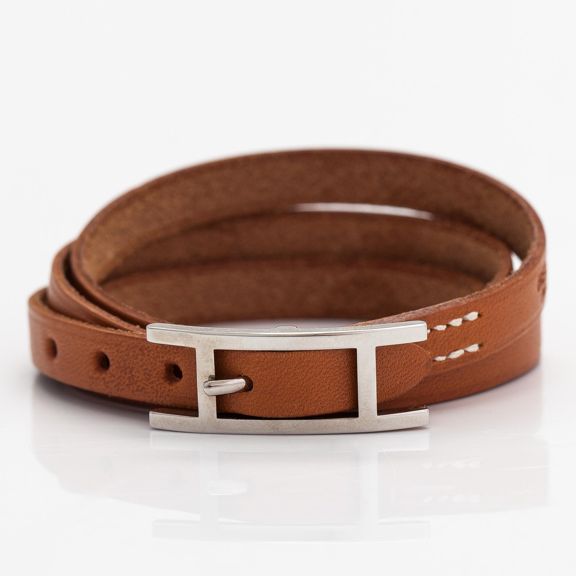 Hermès, armband, läder och silverfärgad metall. Märkt Hermès Paris.