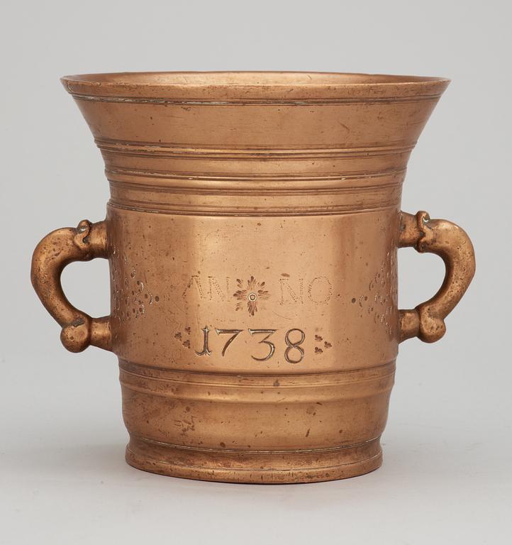 A bronze mortar dated 1738.