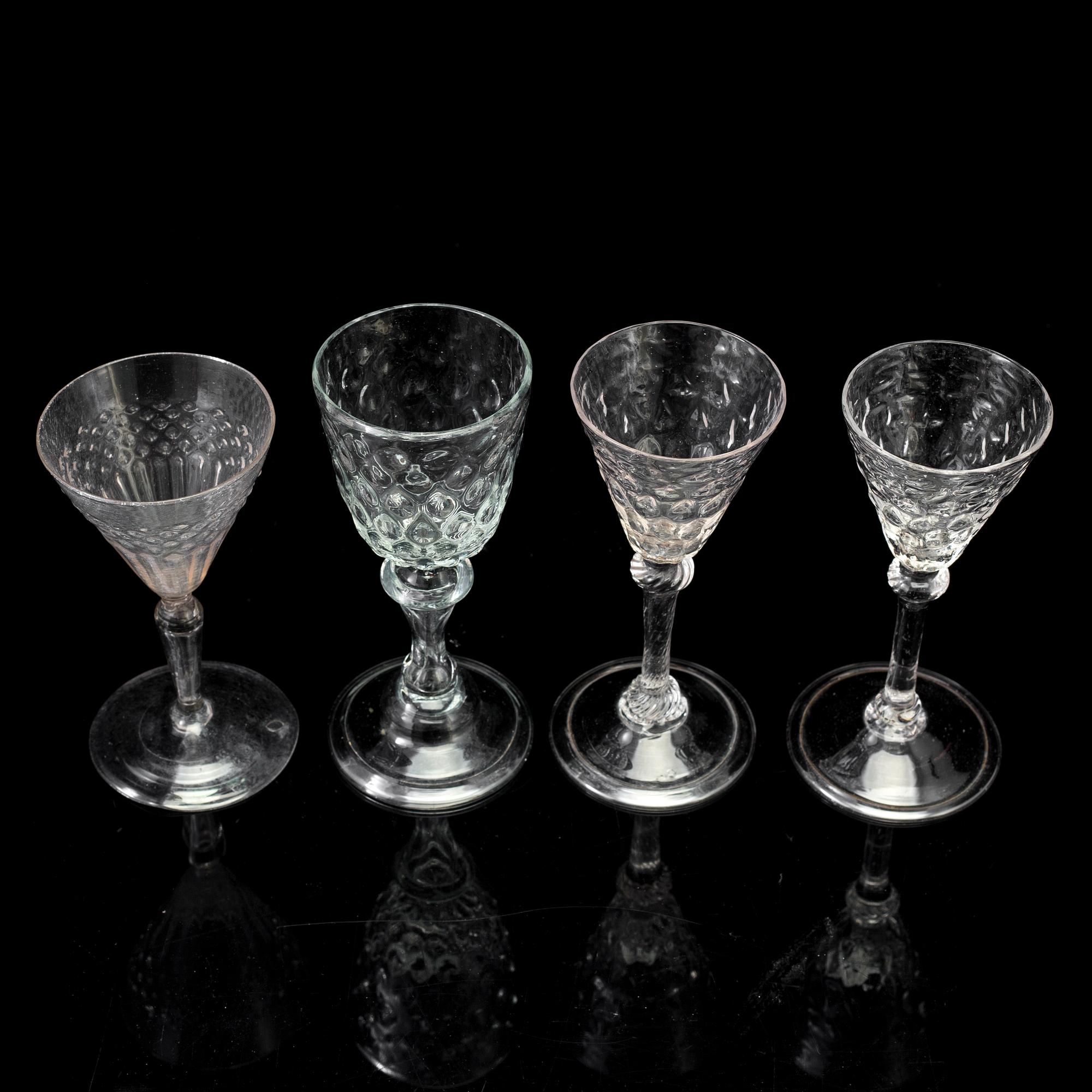 FOUR WINE GLASSES, late 18th century.