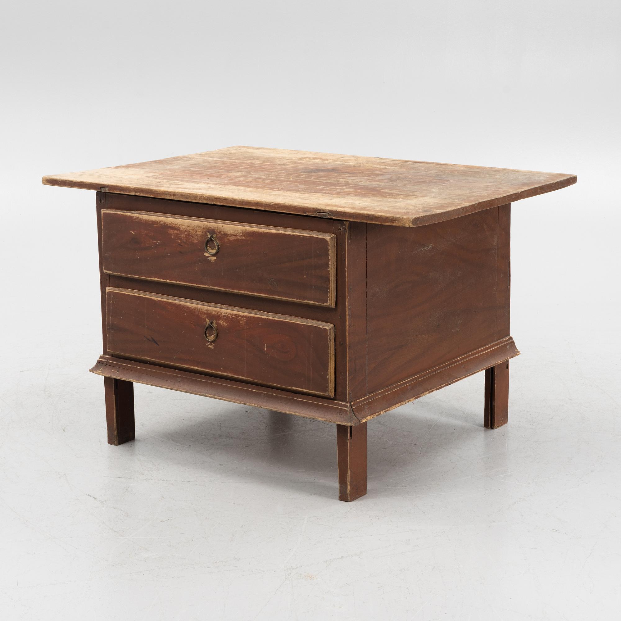 A painted table with drawers, 19th Century.