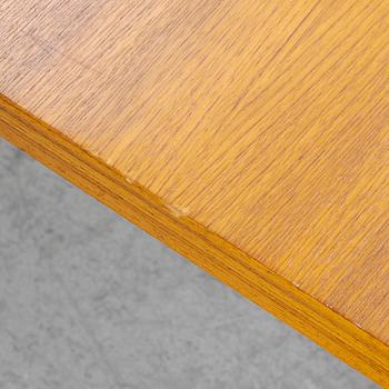 A dining table, 1950s/60s.