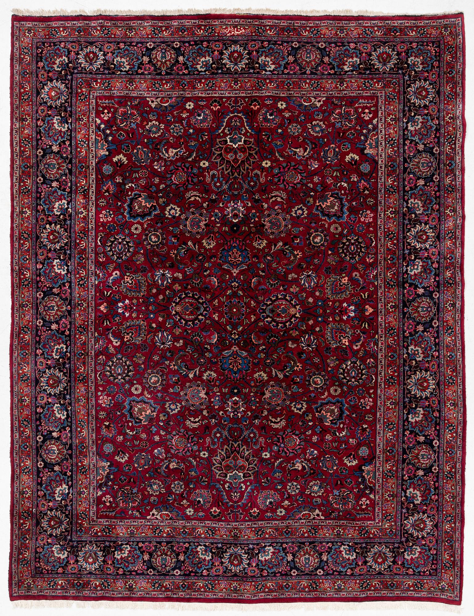 A Meshed carpet, c. 393 x 305 cm.