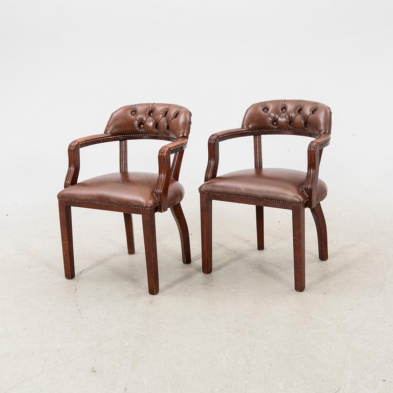A pair of leather armchairs from the second half of the 20th century.