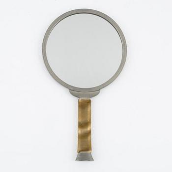 A pewter and brass hand mirror, Svenskt Tenn, 1930's.