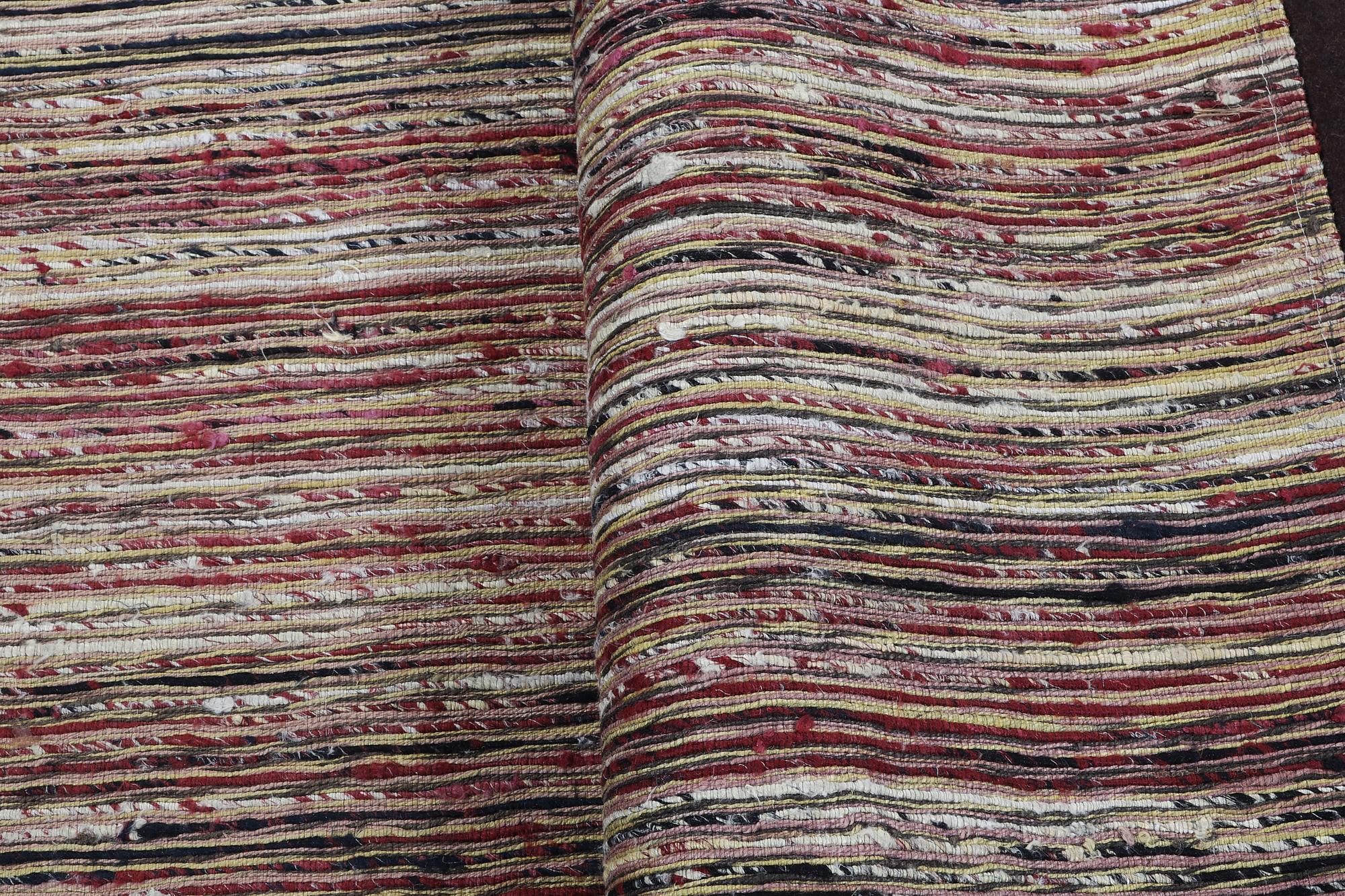 An Afghan kilim carpet, c. 230 x 161 cm.