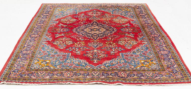 A Persian carpet, c. 315 x 220 cm.