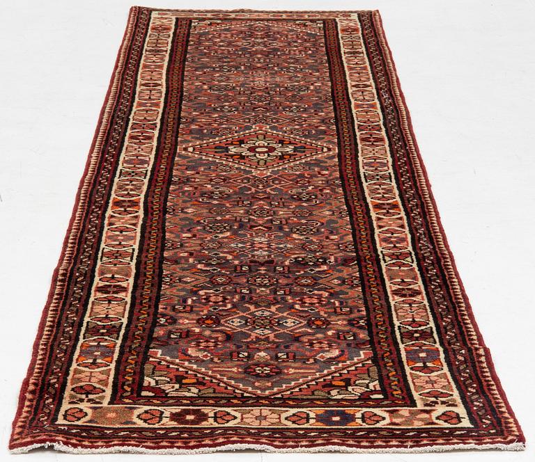 A runner  carpet, Hamadan, 305 x 80 cm.