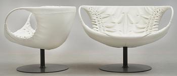 A pair of Patricia Urquiola 'Smock' steel and white leather easy chairs, Moroso, Italy.