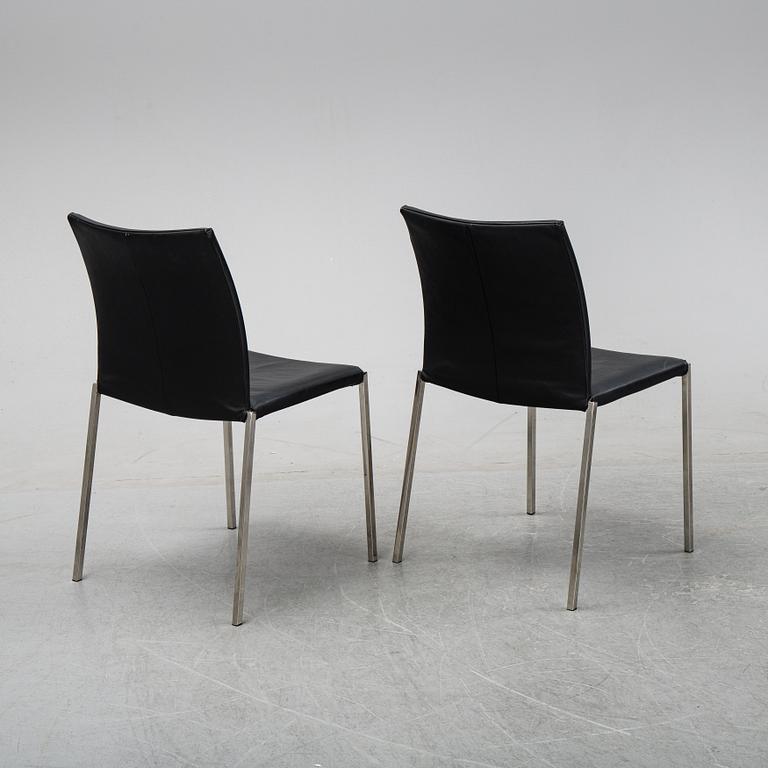 A set of eight steel and leather chairs, 21th century.