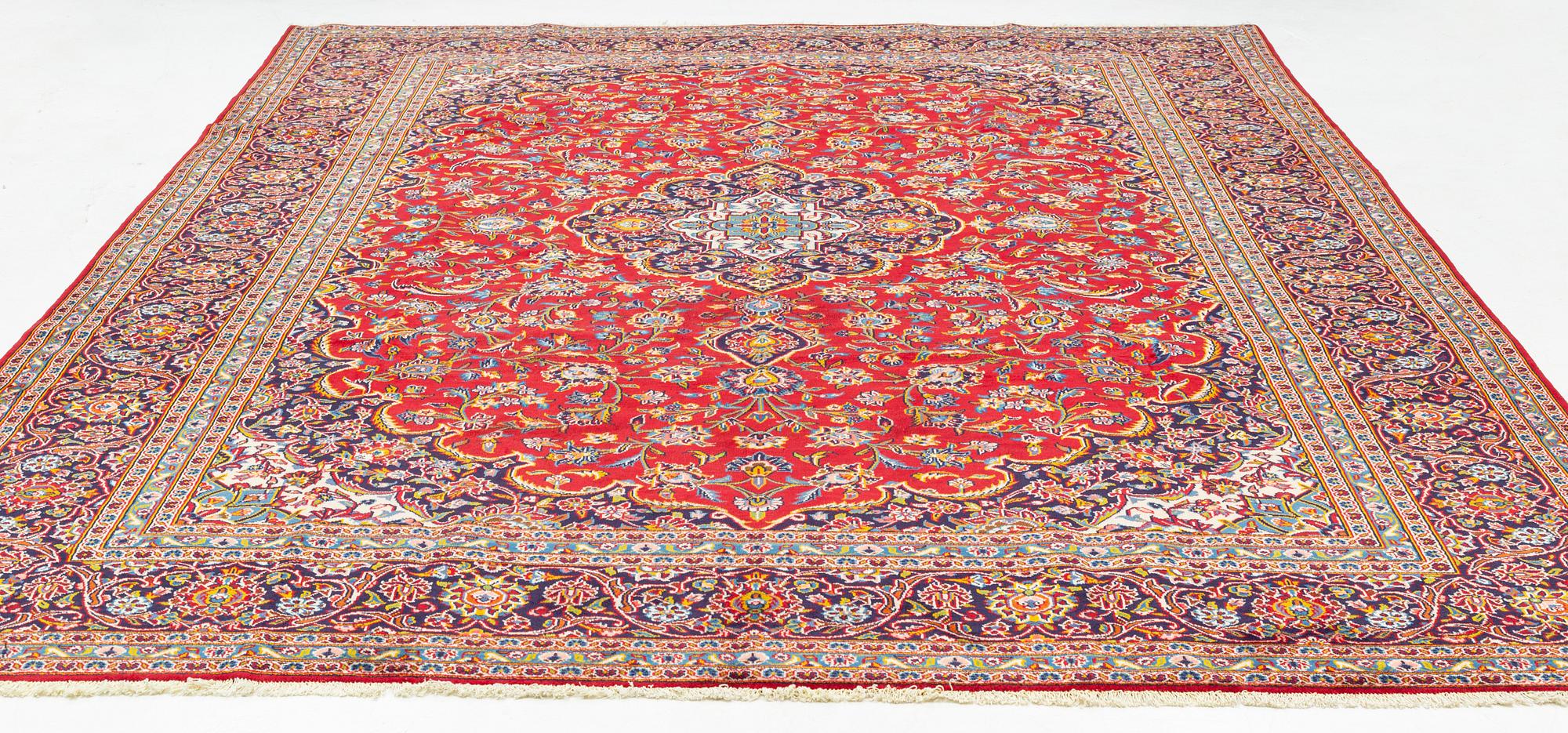 A Keshan carpet, approximately 408 x 287 cm.