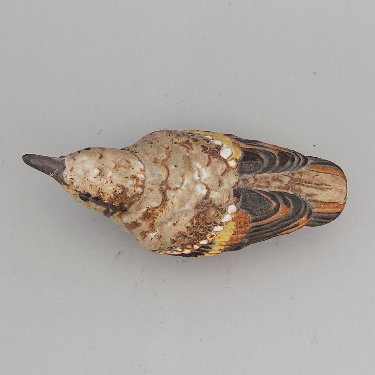 TYRA LUNDGREN, a stoneware sculpture of a bird, signed.