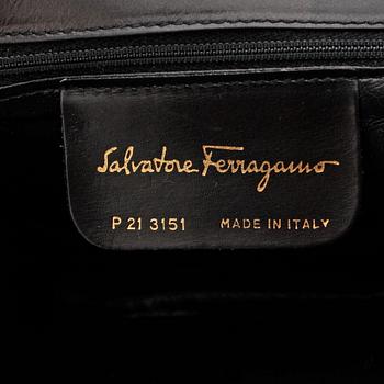 SALVATORE FERRAGAMO, a black suede shoulder bag.