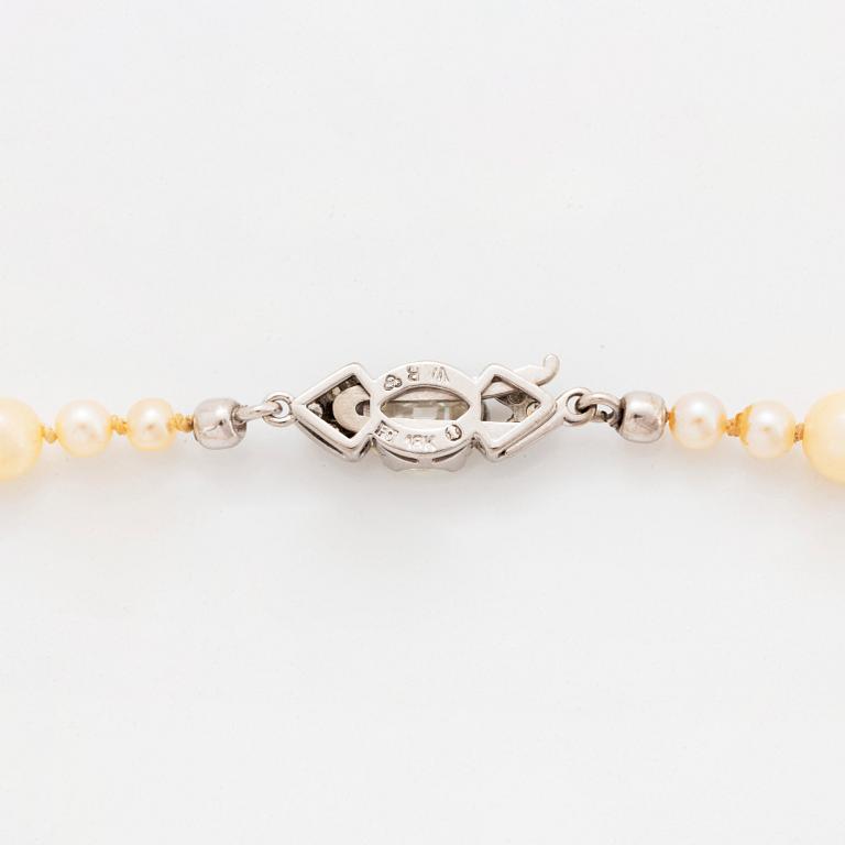 A cultured pearl necklace with a WA Bolin clasp.