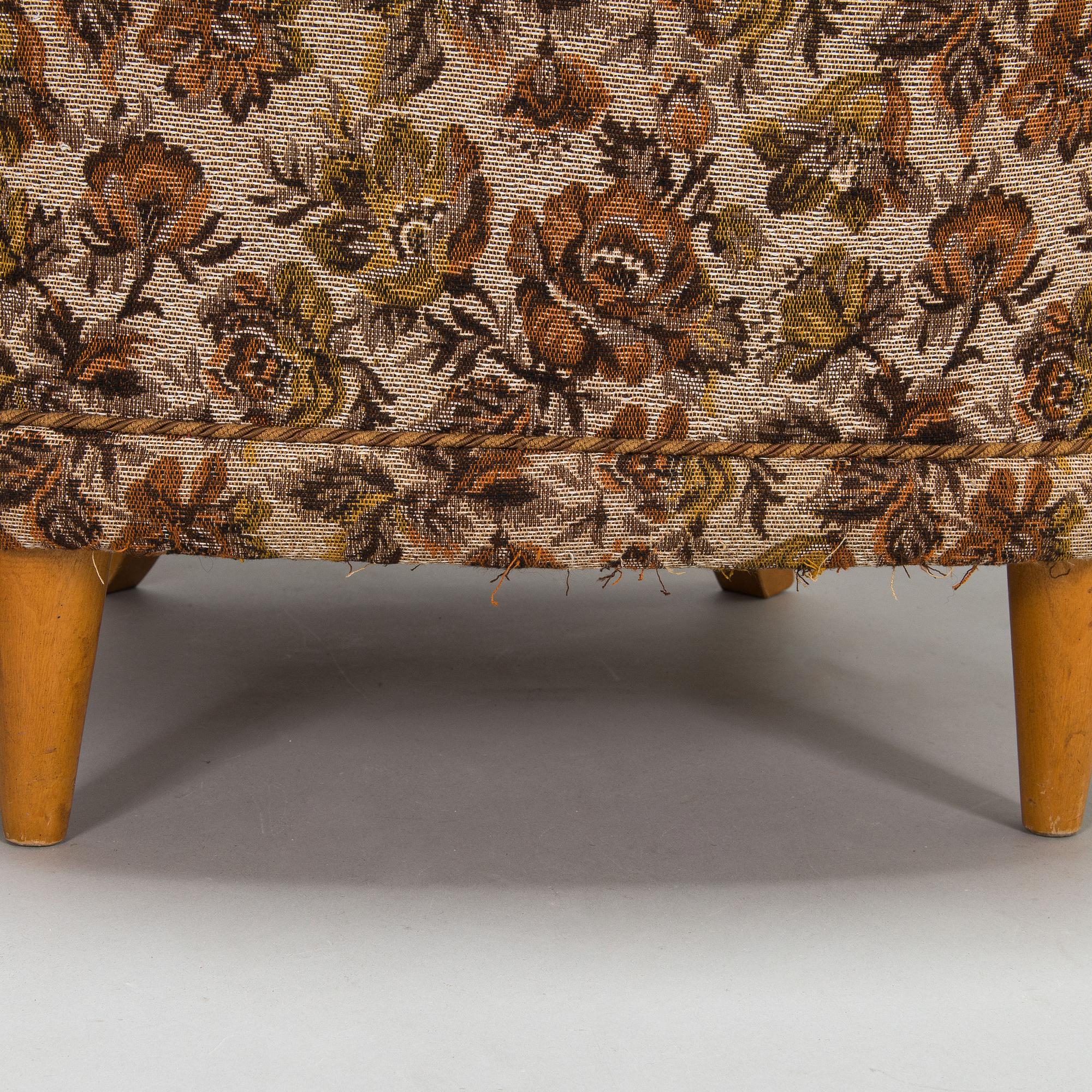 A pair of 1950's armchairs.