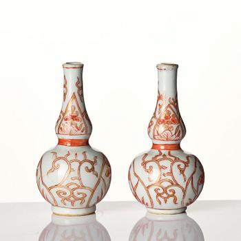 A set of three iron-red decorated water droppers, Qing dynasty, Kangxi (1662-1722).