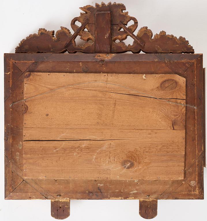 A pair of Swedish Empire two-light girandole mirrors, first half of the 19th century.